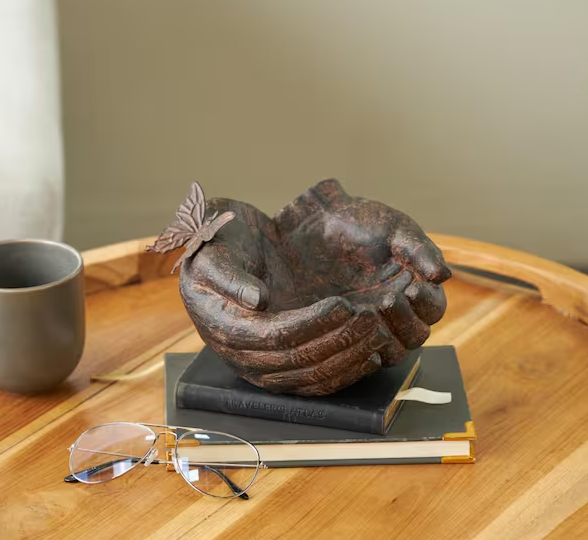 Litton Lane Dark Brown Resin Open Hands Sculpture with Butterfly and Copper Accents