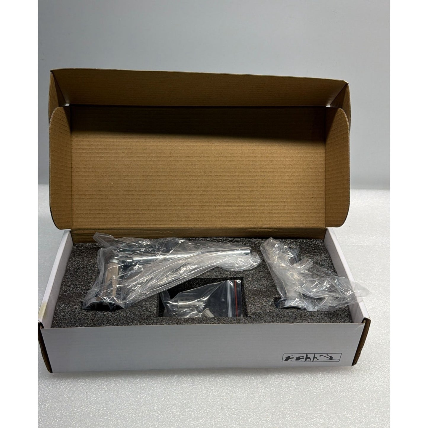 Delta 73550 Saylor Wall Mounted Pivoting Toilet Paper Holder